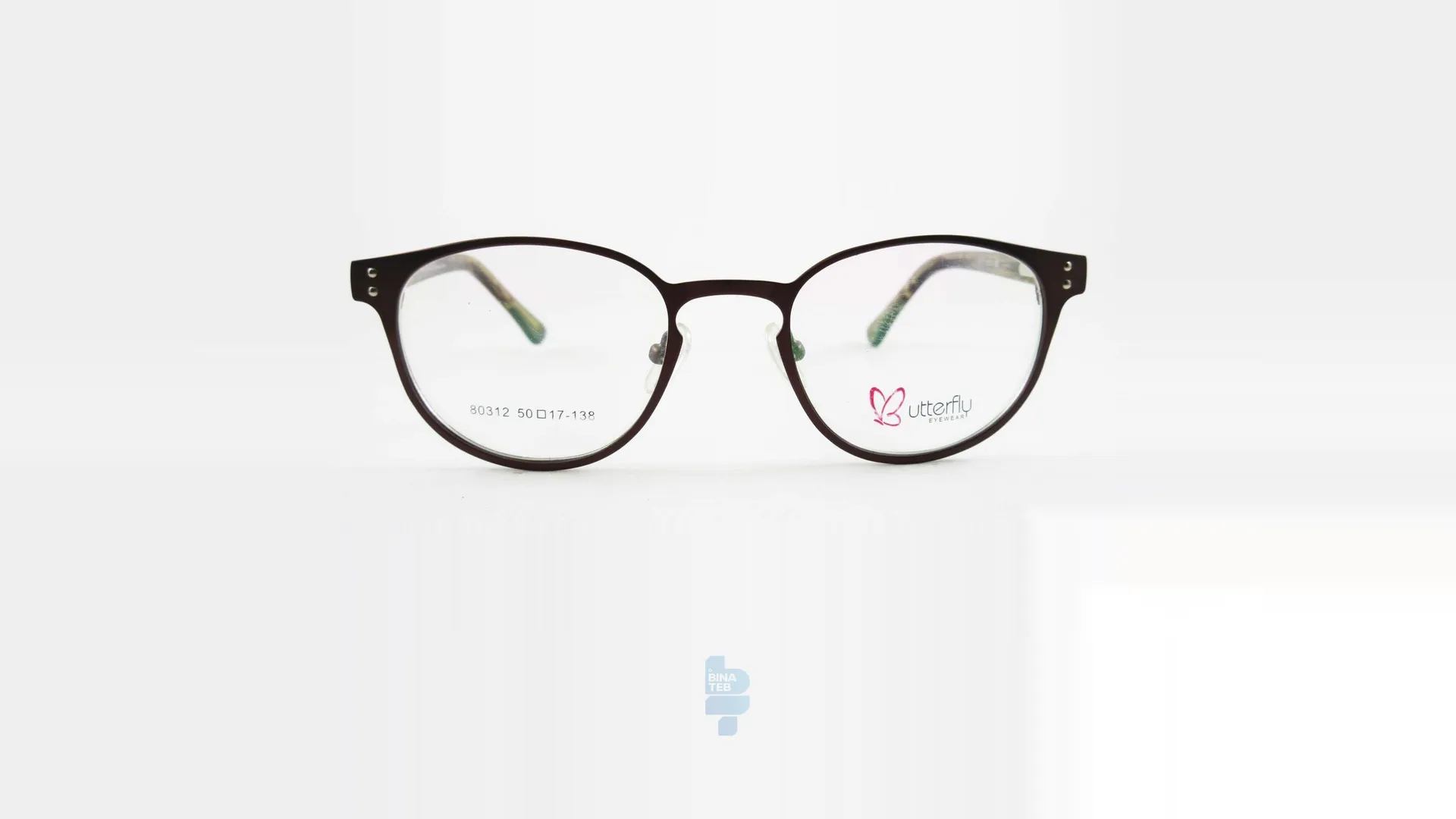 فریم عینک طبی BUTTERFLY زنانه با شکل گرد به رنگ قهوه ای و کد L-80312
